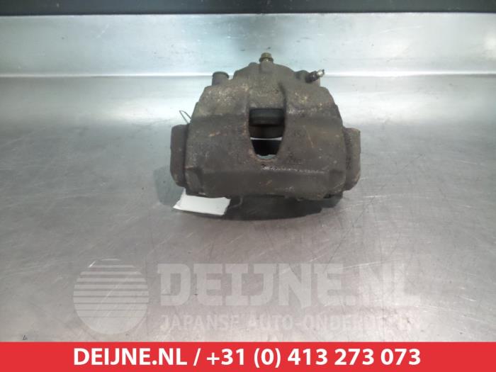 Nissan Primera Remklauw (Tang) links-voor O324846