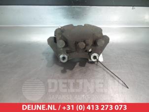 Nissan Primera Bremszange links vorne O324846 foto 2