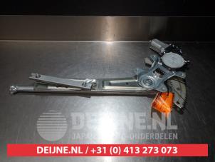 Subaru Justy Window mechanism 4-door, front left O275705 photo 2