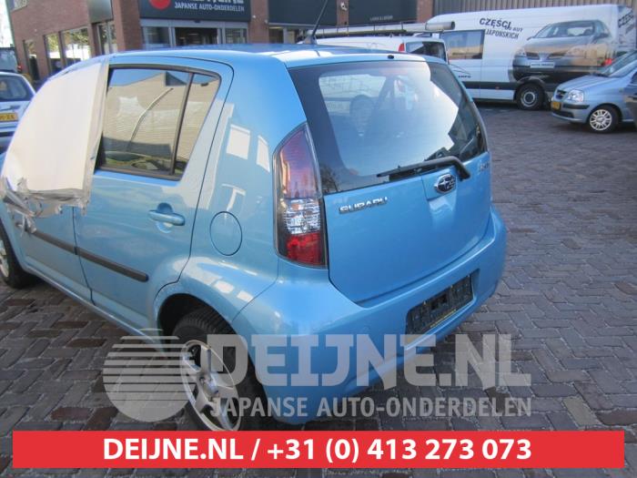 Subaru Justy Türscheibe 4-türig links hinten O287537