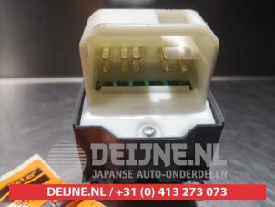 Toyota Yaris Multi-functional window switch O312533 photo 2
