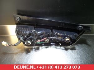 Subaru Justy Rücklicht links O297869 foto 2