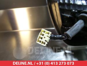 Subaru Justy Rücklicht links O297869 foto 3