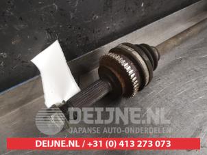Subaru Legacy Aandrijfas links-achter O374861 foto 2