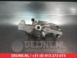 Nissan Primera Remklauw (Tang) rechts-achter O4324 foto 2