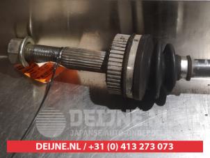 Nissan Qashqai Aandrijfas links-achter O374809 foto 2