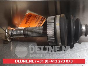 Nissan Qashqai Aandrijfas links-achter O374811 foto 2