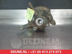 Daihatsu Cuore Fusee rechts-voor O323954 foto 2