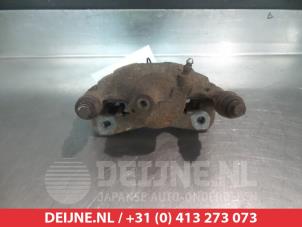 Toyota Starlet Bremszange rechts hinten O377306 foto 2