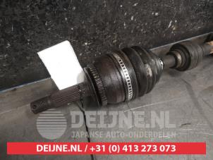 Hyundai Getz Aandrijfas links-voor O317583 foto 2