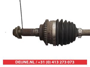 Mazda 323 Front drive shaft, left O317419 photo 2