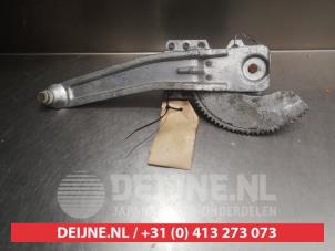 Mazda Demio Ruitmechaniek 4Deurs rechts-achter O291054 foto 2