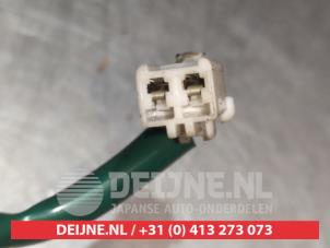 Mazda 323F Ruitenwissermotor achter O300934 foto 4