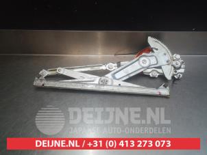 Toyota Starlet Window mechanism 2-door, front right O276309 photo 2