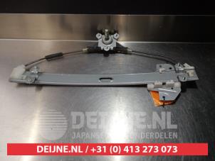 Kia Rio Fenstermechanik 4-türig links hinten O290576 foto 2