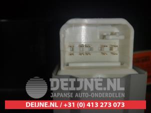 Toyota Verso-S Multi-functional window switch O312543 photo 2