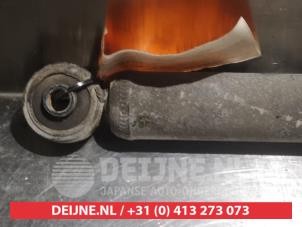 Subaru Justy Schokdemper links-achter O378478 foto 4