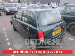 Daihatsu Cuore Tür 4-türig links vorne O272702 foto 2