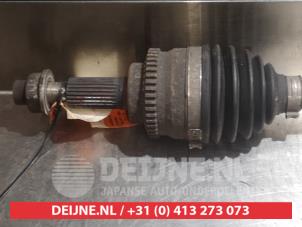 Suzuki Swift Aandrijfas links-voor O318492 foto 2