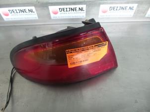 Mazda 323F Taillight, left O297385 photo 3