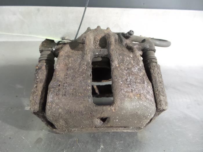 Mitsubishi Carisma Front brake calliper, left O325193