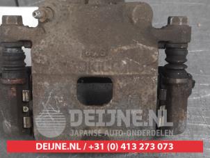 Daihatsu Sirion Front brake calliper, right O326677 photo 3