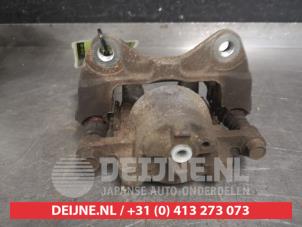 Daihatsu Sirion Front brake calliper, right O326677 photo 2