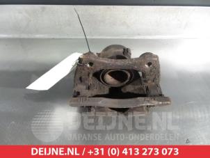 Nissan Micra Bremszange links vorne O324816 foto 2