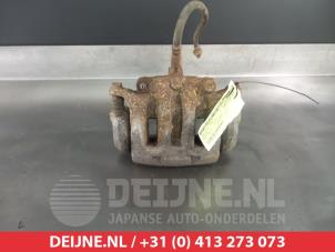 Gebruikte Remklauw (Tang) links-voor Nissan King Cab/Pickup 4x4 (D22) 2.5 TDI 16V Prijs € 50,00 Margeregeling aangeboden door V.Deijne Jap.Auto-onderdelen BV