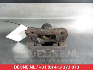 Hyundai XG Bremszange links hinten O376087 foto 2