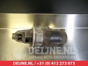 Daihatsu Cuore Startmotor O362442 foto 2