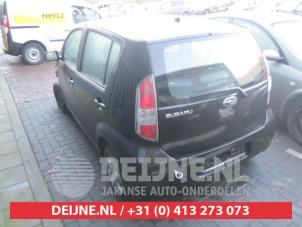 Subaru Justy Rücklicht links O297871 foto 2