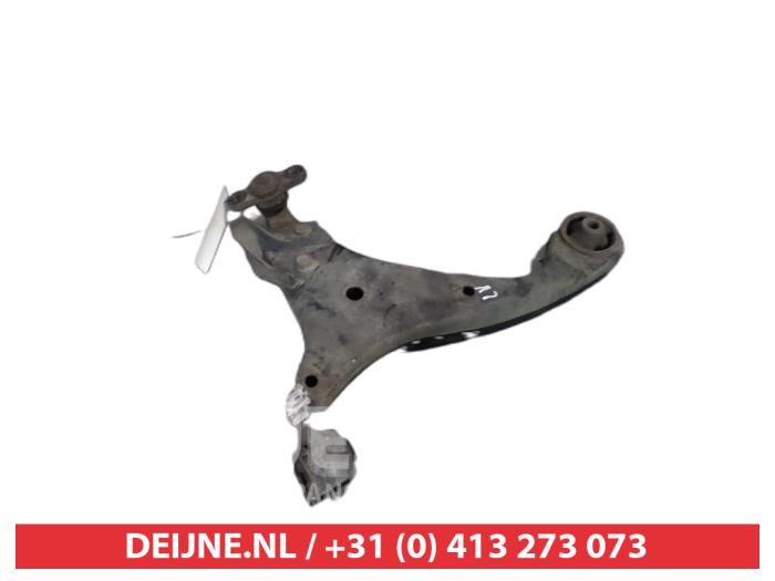 Kia Carens Front lower wishbone, left O381375