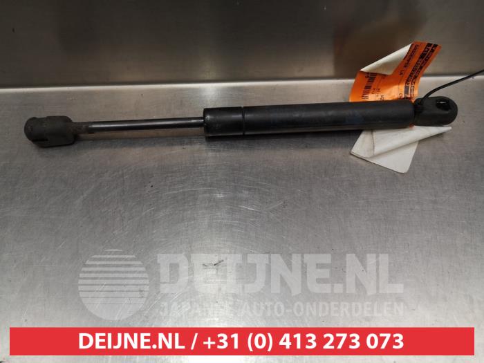 Nissan Primera Gasdemper links-achter O293813