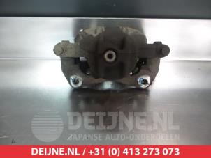Mitsubishi Colt Bremszange links vorne O325243 foto 2