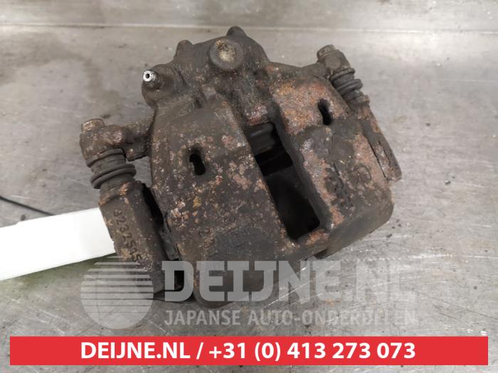 Mitsubishi Colt Remklauw (Tang) rechts-voor O326522