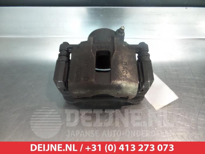 Daewoo Tacuma Bremszange links vorne O325135