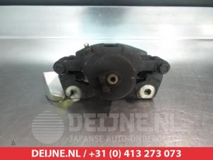 Daewoo Tacuma Bremszange links vorne O325135 foto 2
