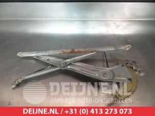 Suzuki Alto Fenstermechanik 4-türig links hinten O290814 foto 2