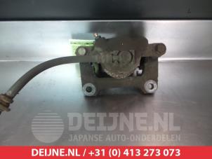 Suzuki Ignis Front brake calliper, left O325473 photo 2