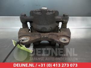 Daihatsu Cuore Front brake calliper, right O326663 photo 2