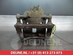 Mitsubishi Space Star Bremszange links vorne O325205 foto 2