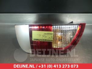 Ssang Yong Kyron Rücklicht links O298122 foto 2