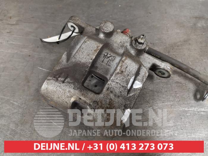 Suzuki Swift Bremszange links vorne O325544