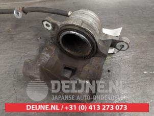 Suzuki Swift Front brake calliper, left O325544 photo 2