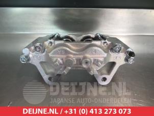 Mitsubishi Pajero Remklauw (Tang) links-voor O32945 foto 2