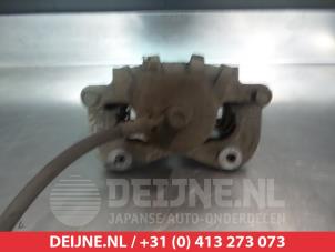 Hyundai Coupe Bremszange links vorne O324734 foto 2