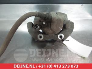 Mazda 3 Bremszange links vorne O324545 foto 2
