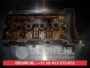Mazda 626 Kleppendeksel O353032 foto 4