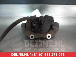 Mazda 5 Bremszange links vorne O324640 foto 2